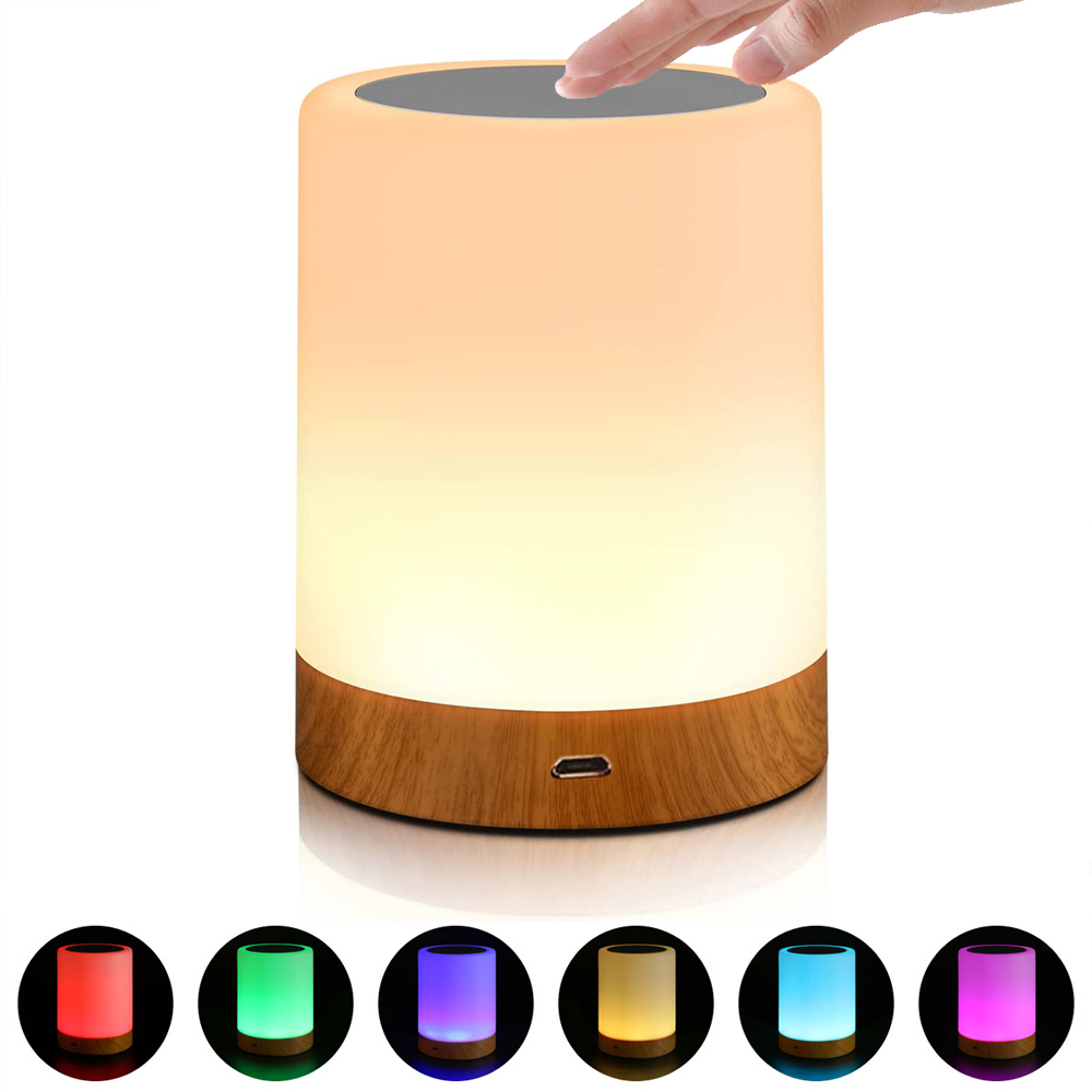 on y voit la Lampe cylindrique vu de face sur un fond blanc, le produit est éteint et en bas de l'mage on y voit les 6 couleurs de LED sélectionnables