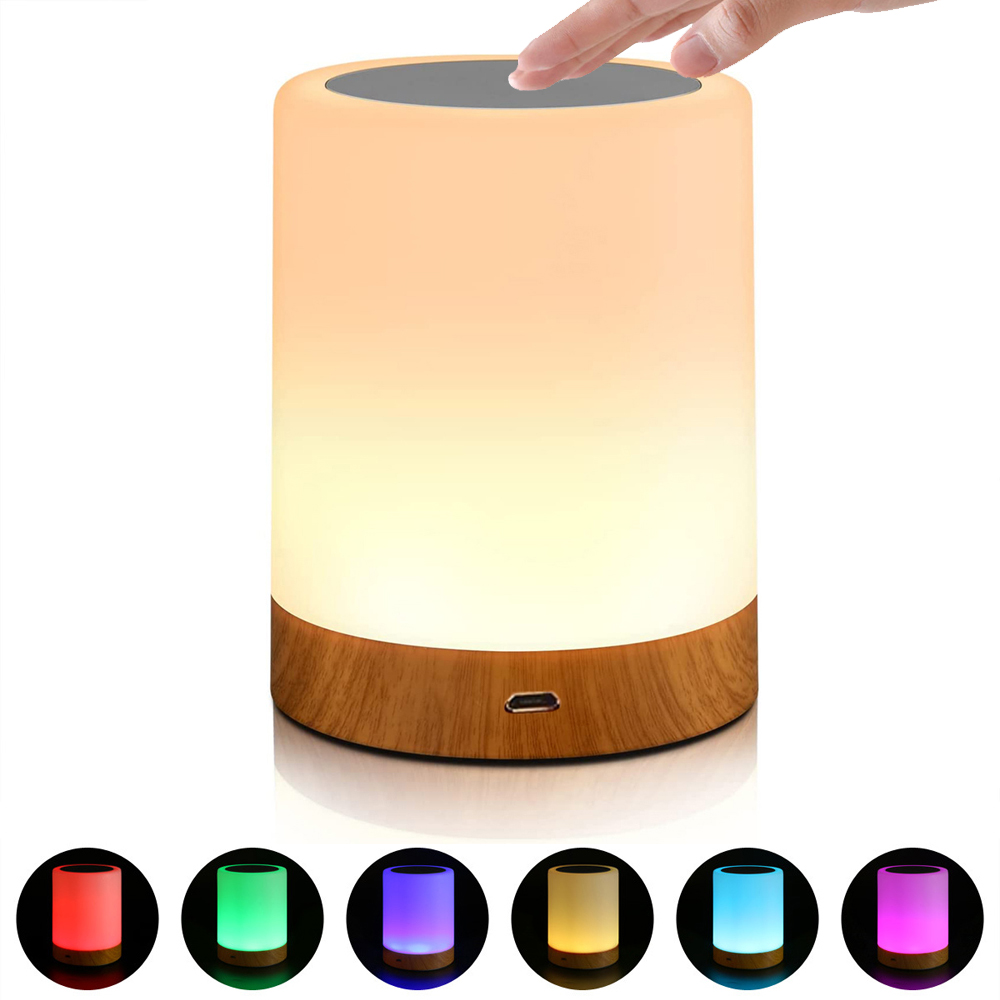 on y voit la Lampe cylindrique vu de face sur un fond blanc, le produit est éteint et en bas de l'mage on y voit les 6 couleurs de LED sélectionnables 